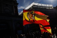 Banderas de España con el águila de San Juan, en una manifestación en memoria de Franco.