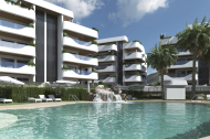 Las zonas comunes de Aurum incorporan piscina tipo playa, cascada integrada y espacios pensados para disfrutar del exterior todo el año.