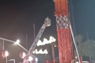 Las personas atrapadas en la atracción averiada.