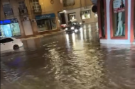 Calle anegada de agua esta Nochebuena en Roquetas