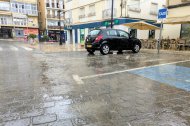 Parte del centro de Albox encharcado este jueves por la lluvia.