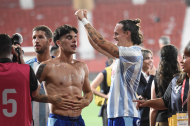 Brasanac, primero de izquierda a derecha, celebrando en ascenso del Málaga.