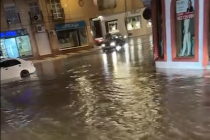 Calle anegada de agua esta Nochebuena en Roquetas