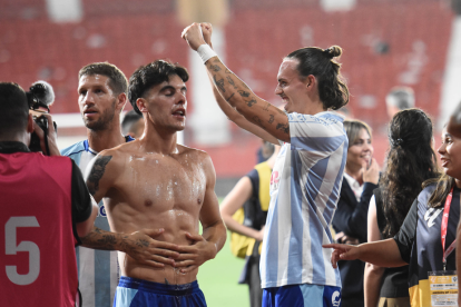 Brasanac, primero de izquierda a derecha, celebrando en ascenso del Málaga.