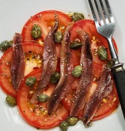 Tomate y anchoas.