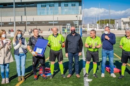 Foto de familia con los tres protagonistas.