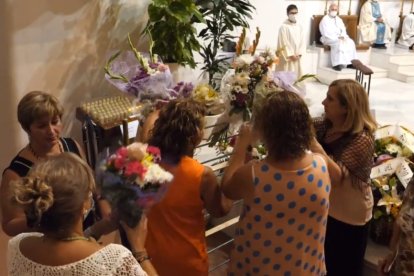 Ofrenda floral a la Virgen del Carmen.