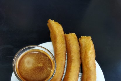 Los churros con café.