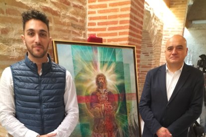 El concejal Jesús Luque y Enrique Marín, junto al cartel de la Semana Santa 2023