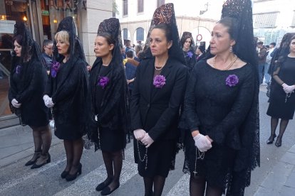 Camareras de La Merced por la calle Marín.