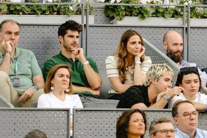 Melero y Lucía, viendo tenis en La Caja Mágica.