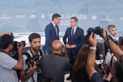 Fotoperiodistas en el debate.