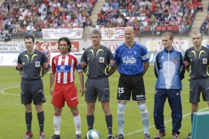 Los capitanes del último derby Ortiz y Burgos.