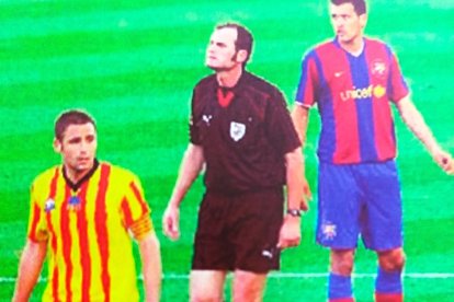 Con Busquets en segundo plano.