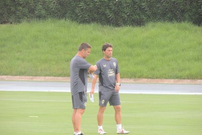 Rubi con su ayudante.