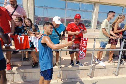 Lucas Robertone y Antonio, un seguidor muy viajero.