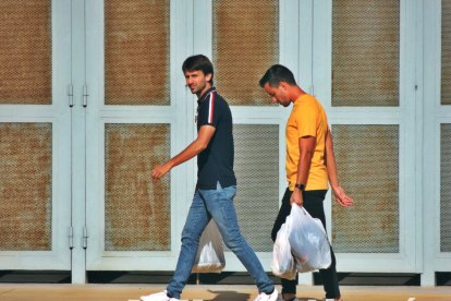 Agenjo y Borja camino de la sede rojiblanca.