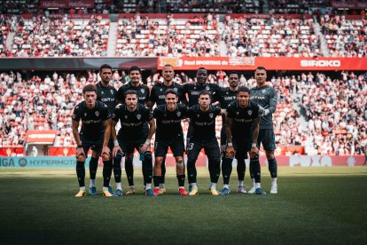El once de la UD Almería en El Molinón.