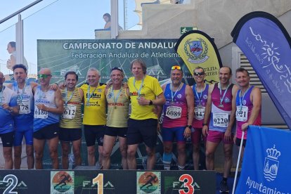 El CD Unión Atletas de Almería en el podio.
