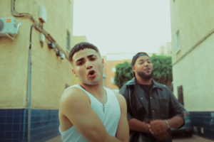 El artista emergente Ate junto a Nioma en su último videoclip.