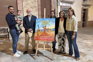 El autor del cartel de la Feria de Todos los Santos de Albox, Andrés del Águila, junto a la alcaldesa y familiares.