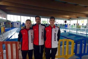 Etxebarría y Rueda con su entrenador José Núñez. 