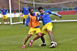 Los dos jugadores en una sesión de entrenamiento.