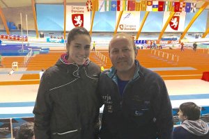 La campeona con su técnico.