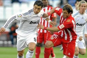 Bernardello con Cristiano Ronaldo en su etapa en el Almería.