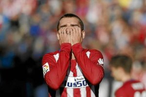 Los jugadores del atléti lo intentaron hasta el final.