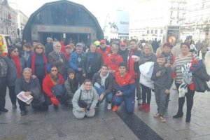 Foto de familia en la Puerta del Sol.