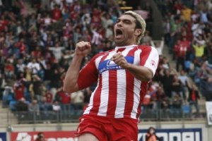 Michel, de rojiblanco.