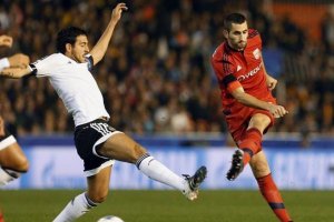 Dani Parejo en el encuentro con el Olympique.