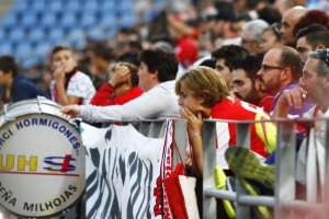 Aficionados muy tocados.