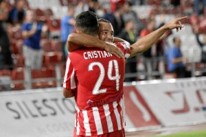 Quique celebra el fol a pase de Cristian.