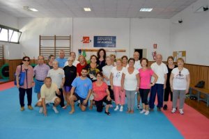 María Vázquez con los mayores deportistas.