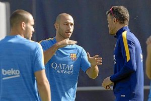 Macherano en el entrenamiento del Barça.
