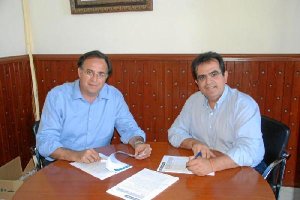 Firma del contrato entre las dos partes.