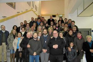 Foto de familia de los asistentes.