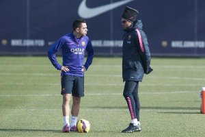 Xavi con su míster.