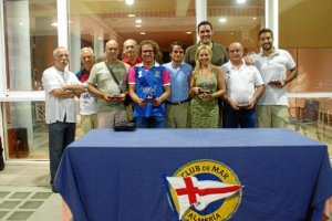 El concejal de Deportes con los vencedores.