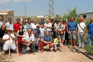 Foto de familia de los premiados del año anterior.