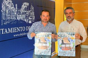 Santiago Gallego y Andrés Cano con los carteles de la Feria.e;c