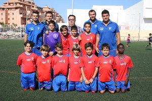José Juan Rubí, con los miembros del equipo benjamín.e;clip:rec