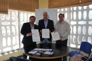 Firma del convenio entre las partes involucradas.e;clip:rect(46