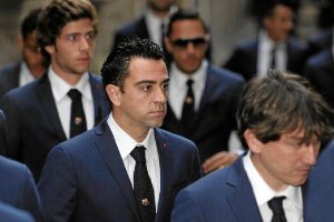 Xavi Hernández con sus compañeroso,46