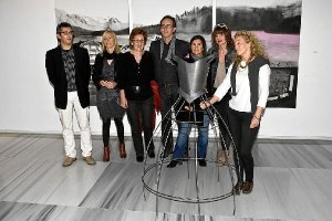 Foto de familia de la inauguración de la muestra.e;clip:rect(46