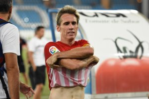 Corona, con cara de sufrimiento.