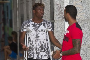 Jonathan con Michel Macedo.