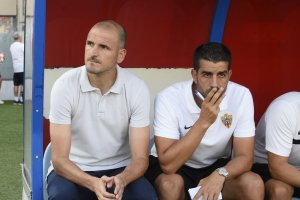 Soriano y Juanito en el banquillo.